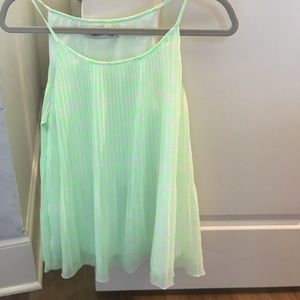 Light green and white pleated tank top.